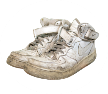 Well-worn white sneakers ready for a second life